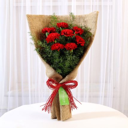 8 Red Carnations Bouquet in Jute: 