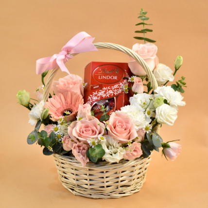 Elegant Flowers & Lindt Chocolate Willow Basket: Flowers And Chocolates