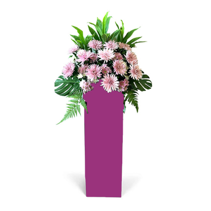 Elegant Pink Flowers Arrangement In Pink Stand: 