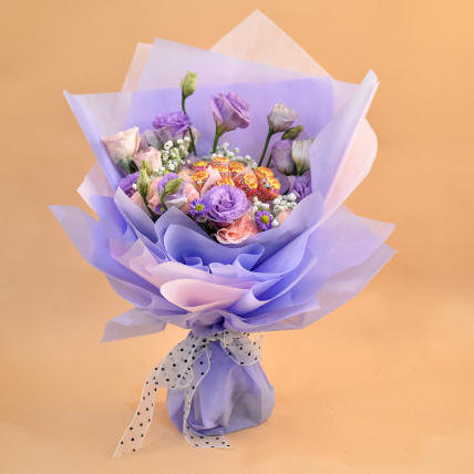 Lovely Mixed Flowers & Chupa Chups Bouquet: Flowers And Chocolates