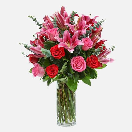 Mixed Roses Stargazer lilies in Glass Vase Arrangement: 