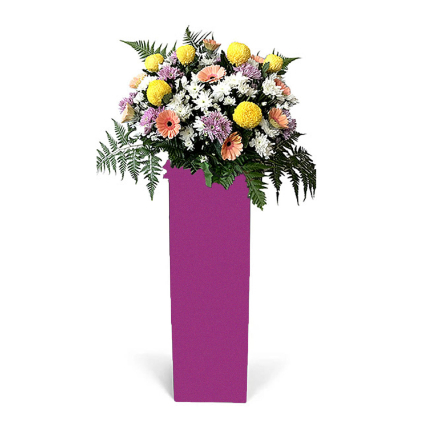 Premium Mixed Flowers With Pink Stand: 