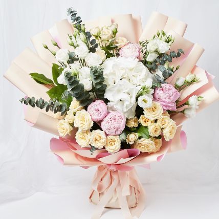 Ravishing Mixed Flowers Wrapped Bouquet: Mixed Flowers 