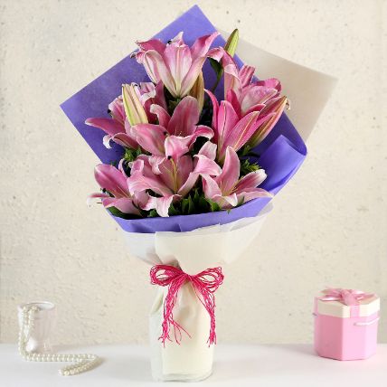 Alluring Pinkish Oriental 12 Lilies Bouquet