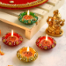 4 Designer Diyas and Golden Pagdi Ganesha Idol