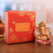 4 Mango Shaped Diyas and Pink Dhoti Ganesha Idol