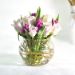 beautiful tulips roses arrangement in fish bowl