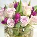 beautiful tulips roses arrangement in fish bowl