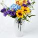 delightful mixed flowers ceramic vase arrangement