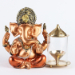 Golden Ganesha Idol With Glass Akhand Diya