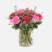 red and pink roses cylindrical vase arrangement